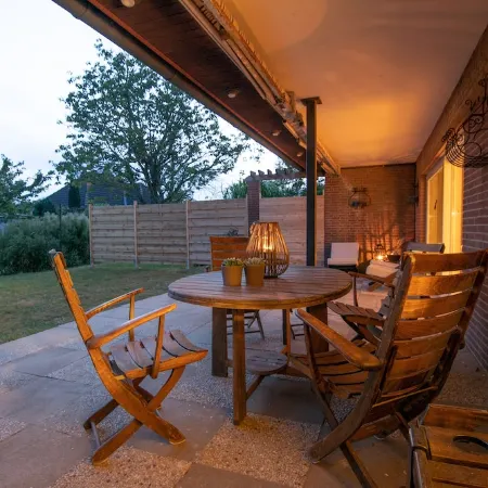 Spacious vacation apartment with garden, surrounded by greenery.