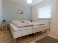 Spacious vacation apartment with garden, surrounded by greenery.