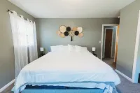 Centrally located 4Bedroom, 5 BEDs & 2Bath; Beautiful backyard