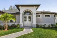 Deluxe 4BD/3BH Waterfront Home with Heated Pool and Golf Access and EV Charger