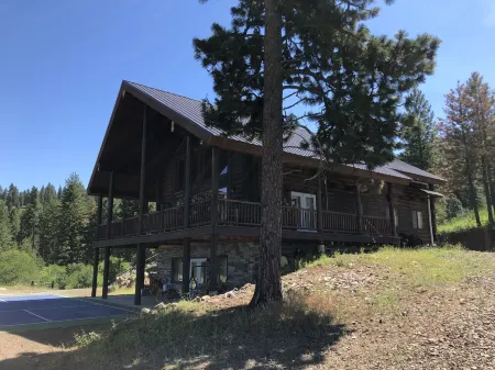Private Log Cabin with breathtaking views on 15 acres adjacent to forest service
