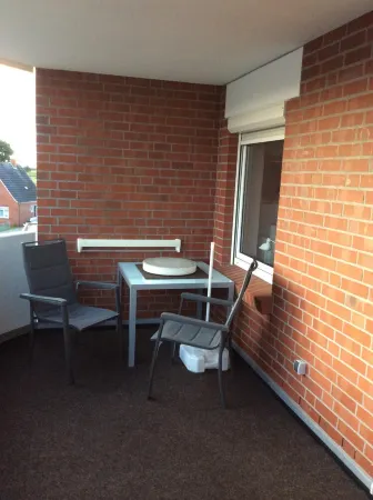 Small holiday apartment in Dornumersiel with a dog