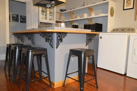 CHEZ MIL is a love story about John and Mildred Hebert in Cajun Country.