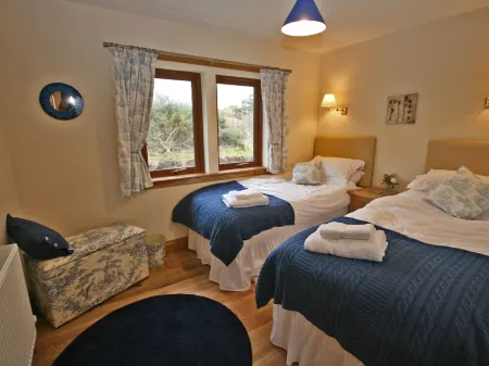 Luxury lodge situated idyllically on the edge of a small working farm