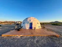 Southern Boho inspired Geodesic Dome nestled up next to Big Bend National Park.