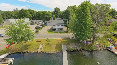 The Inn at Highland Lake, 1st Floor, waterfront yard with a boat dock