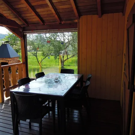 Fenced cottage rental with barbecue and children's play area