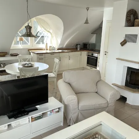Exclusive apartment on two floors near the beach with a fireplace Отели в г. Цингст