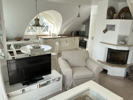 Exclusive apartment on two floors near the beach with a fireplace