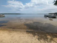 NEW! Renovated lakeside cottage with a private sandy beach. Great Location!