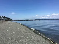 Beach house with views of Puget Sound, ferry, North Cascades, Mt Baker, Rainier.