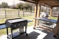 Serene 4-Bedroom House with BBQ, 5-TVs in McKinney Facing Park & Pond Sleep 12