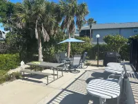 Beautiful waterfront condo with a boat dock, pool, and across from the beach