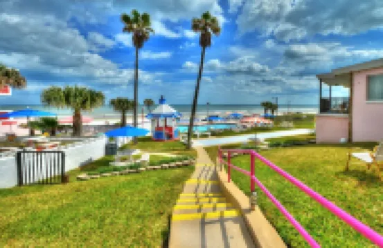 Pet-Friendly, Beach-Themed Tropical Manor 2 Bedrm Apts Across from Daytona Beach