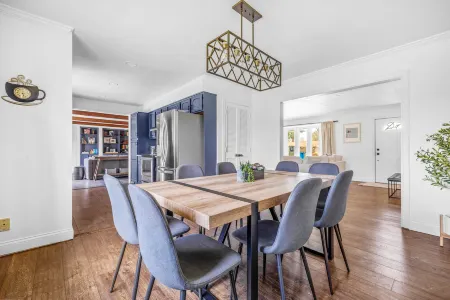 Charming Backyard Oasis with Fire Pit and Rec Room - Inviting Getaway