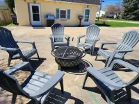 Fire Pit and Outdoor Games Await - Charming Family Retreat Hotels in Alpena