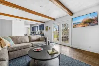 Charming Backyard Oasis with Fire Pit and Rec Room - Inviting Getaway