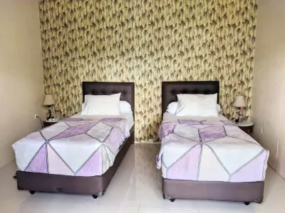 Amuya Home Stay Hotel dekat Erom Mart