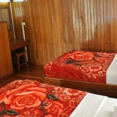 Nanda Wunn Hotel - Hostel Отели рядом с достопримечательностью «Монастырь Шве-Ян-Пяй»