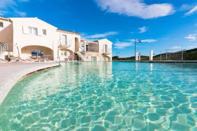 Residence SardegnaSummer Li Mori فنادق في Budoni