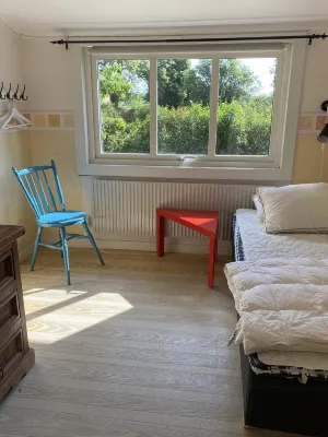 Traditional Swedish wooden house by Lake Torsjön Hotels in 