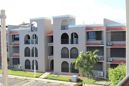 Steps away from a soft sand beach and warm waters