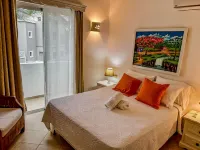 Cozy Apartment with 24/7 pool - 5-10 min walk to Beach, Clubs, activities!