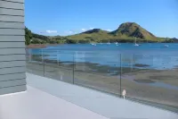 "Beside The SeaMore than an apartment! Absolute waterfront. Swim steps away. Hotels in Whangarei Heads