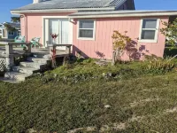 Adorable Pink Cottage-Ocean Front on Coco Bay with a Dock. 25% Fall Discount!