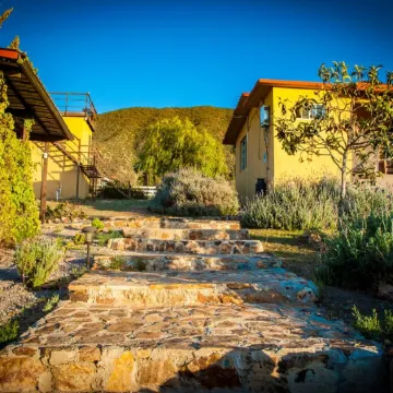 3 comfortable individuals cabins in a property with stunning views of the valley