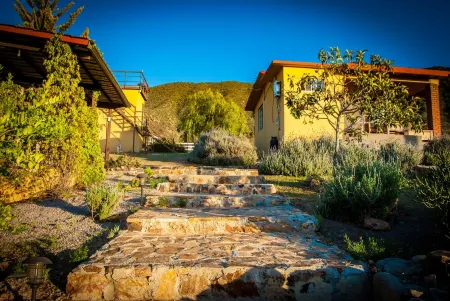 3 comfortable individuals cabins in a property with stunning views of the valley