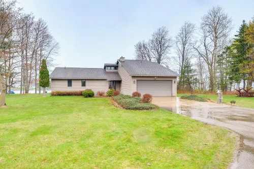 Cadillac Vacation Rental w/ Dock on Lake Mitchell! - WiFi