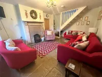Roseleigh Cottage in the heart of Stow-on-the-Wold with parking for 2 cars.