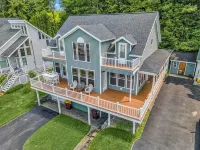Lakeview Retreat with Jacuzzi and Spacious Living Areas - Charming Escape