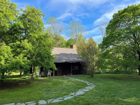 Outrange at Blue Heron Farm. Pet friendly cabin at waterfront farm!