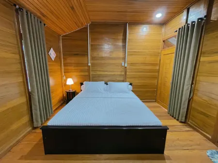 DUA KEMBAR COTTAGE AND RESORT Отели в г. Bunta