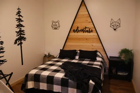 One of a kind 4-bedroom barndominium in Warsaw, Ohio on 23 wooded acres.