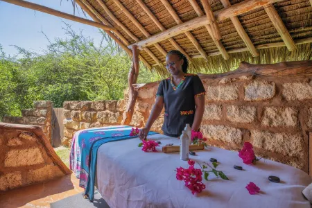 An exclusive, family-friendly retreat with a mix of luxury tents and cottages.