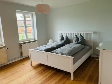 Wunderschöne Ferienwohnung mit Kamin und Großem Garten an der Nordsee Отели в г. Эпенвёрден