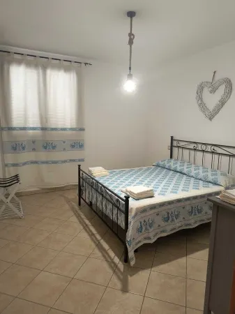 Casa Vacanze Dal Vecchio Pescatore Penisola Del Sinis Отели рядом с достопримечательностью «L'Orchidea dei F.lli Albano»