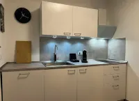 Modern apartment with forest flair and coffee enjoyment