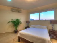 Farito Beachfront Penthouse, Surf & Paddle Board. 普塔 德 米塔住宿飯店