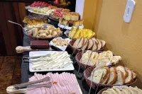 Velinn Pousada Locanda Belvedere - servizio colazione
