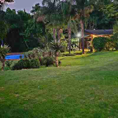 Serene 1-Bedroom Apartment with Garden & Shared Pool Hotel Exterior