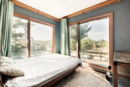 Seosan Badasarang Pension Town Отели рядом с достопримечательностью «Beolcheon Auto Campground»