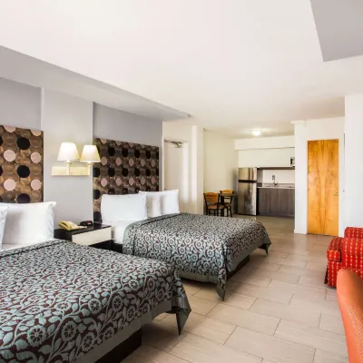 Arya Blu Inn and Suites Hotels near Bellair Plaza