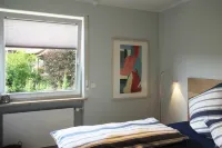 Modern flat facing south with view over mountains and lake