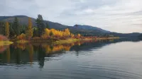 10 Acre Private riverfront retreat w/ dock and 1,000 ft waterfront