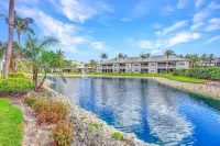 FIRST FLOOR 3/2, GOLF, POOL, TENNIS, BEAUTIFULLY  REMODELED CLOSE TO BEACHES