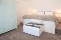 HOLIDAY APARTMENT WITH OWN SEA ACCESS AND GARDEN